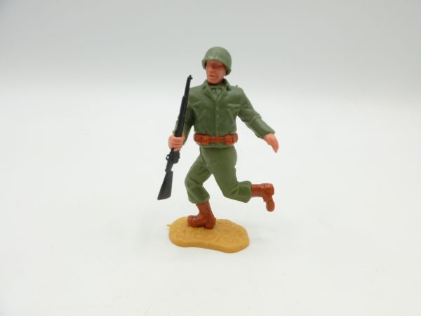 Timpo Toys American running, holding rifle
