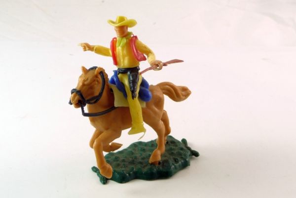 Transogram Cowboy mounted with rifle