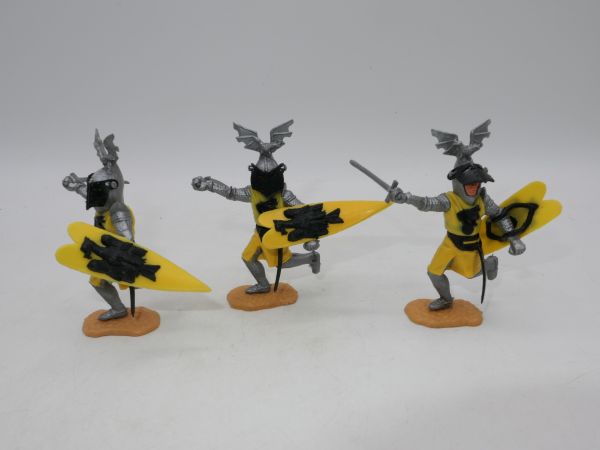 Timpo Toys 3 Visor knights running, yellow/black - shield loops ok