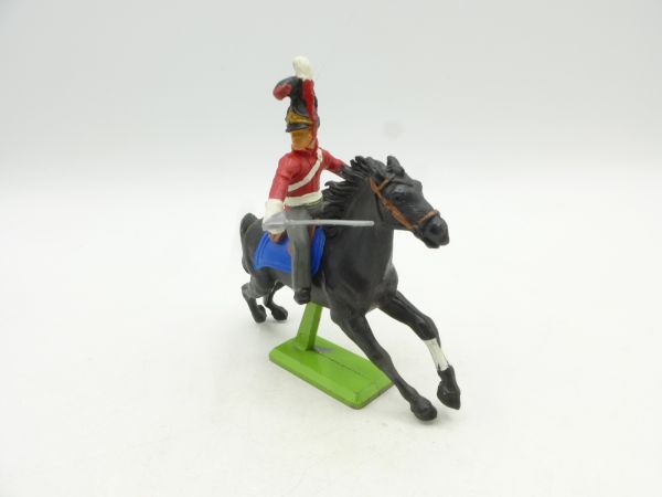 Britains Deetail Waterloo soldier on horseback, sabre at side, red/white uniform