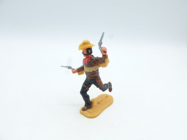 Timpo Toys Cowboy 4. Version laufend mit 2 Pistolen wild schießend