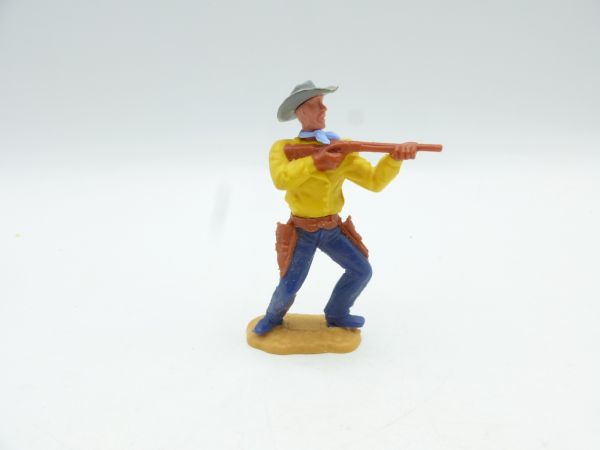 Timpo Toys Cowboy 2nd version standing with short rifle, yellow