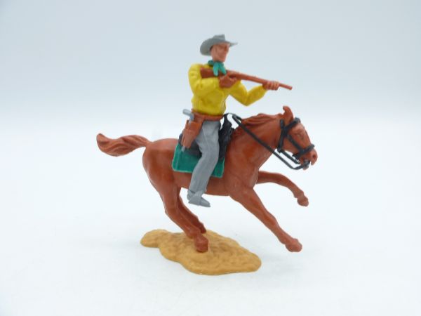 Timpo Toys Cowboy 2. Version reitend mit kurzem Gewehr