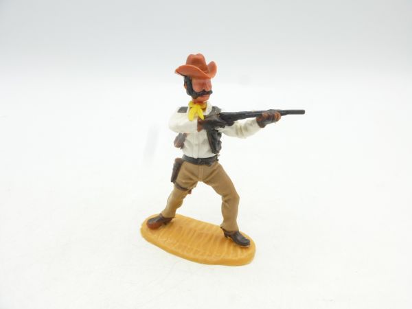 Timpo Toys Cowboy 4th version standing shooting, beige trousers