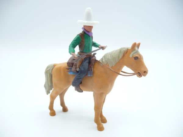 Britains Swoppets Cowboy riding, rifle in front of the body