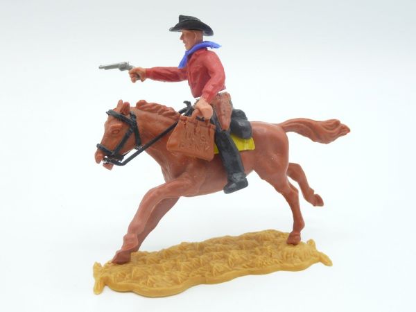 Timpo Toys Cowboy 2nd version riding with pistol + moneybag