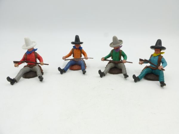Britains Swoppets Great set of 4 different Cowboys on a tree trunk