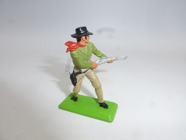 Britains Deetail Cowboy standing, shooting rifle from hip