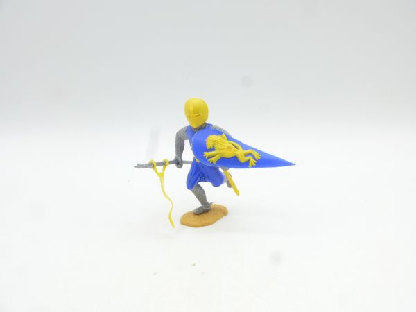 Timpo Toys Medieval knight, medium blue/yellow, running with flag - rare