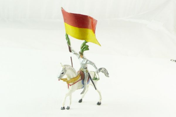 Merten Knight riding with flag