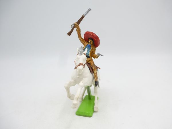 Britains Deetail Mexican riding, holding rifle above + pistol