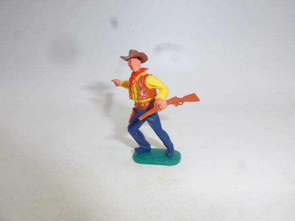Timpo Toys Cowboy 2. Version mit Gewehr, zeigend, braune Bodenplatte