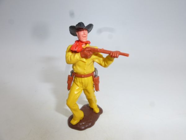 Timpo Toys Cowboy 2. Version stehend mit kurzem Gewehr, gelb