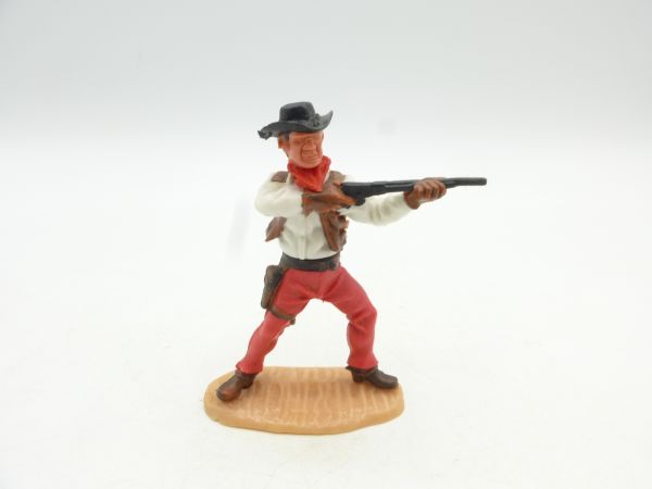 Timpo Toys Cowboy 4. Version stehend mit kurzem Gewehr schießend
