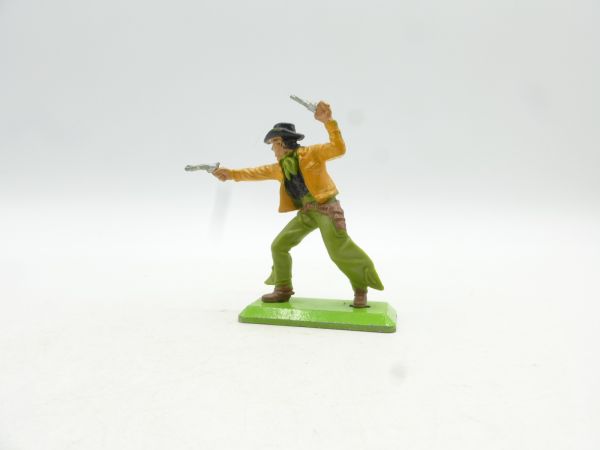 Britains Deetail Cowboy advancing, firing wild with 2 pistols, black hat