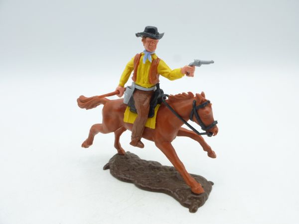 Timpo Toys Cowboy 3rd version on horseback with pistol + rifle