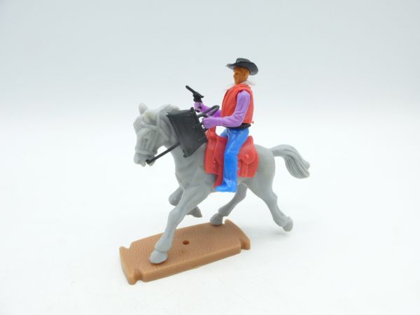 Plasty Cowboy riding with pistol + moneybag