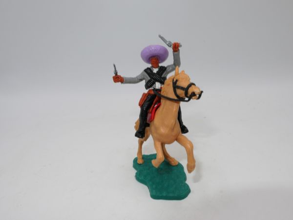 Timpo Toys Mexican on horseback, shooting 2 pistols wildly, purple hat