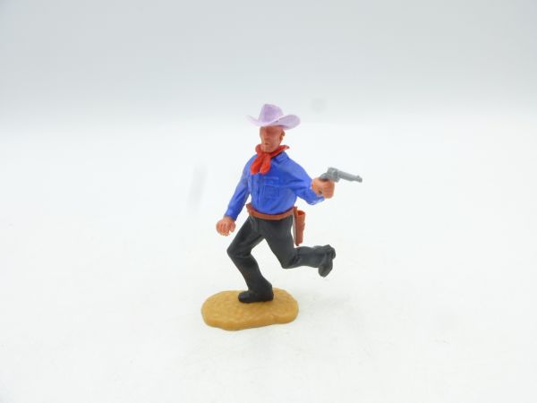 Timpo Toys Cowboy laufend mit Pistole - toller fliederfarbener Hut
