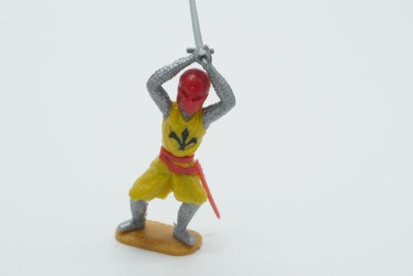 Timpo Toys Medieval knight crouching, sword over head, dark-yellow/red