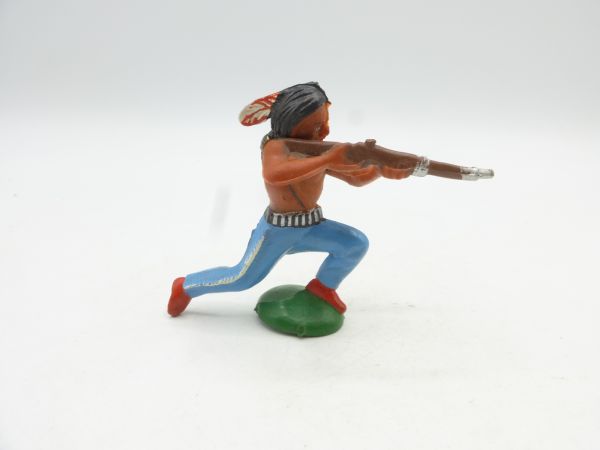 Indian kneeling shooting rifle, light blue trousers