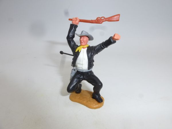 Timpo Toys Cowboy 2. Version hockend, von Pfeil getroffen, schwarz