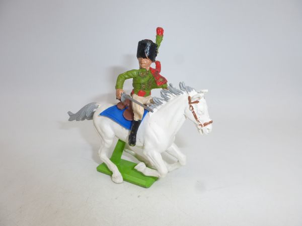 Britains Deetail Waterloo soldier green/red on horseback, holding sabre sideways
