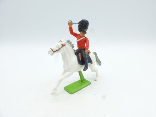 Britains Deetail Waterloo soldier on horseback, lunging sabre, red uniform