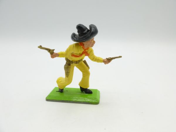 Britains Deetail Mexican going forward with 2 pistols, yellow