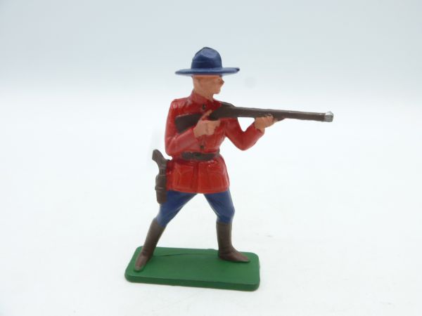 Starlux Mountie standing with rifle at the ready