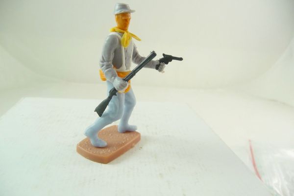 Plasty Confederate Army soldier standing with pistol + rifle