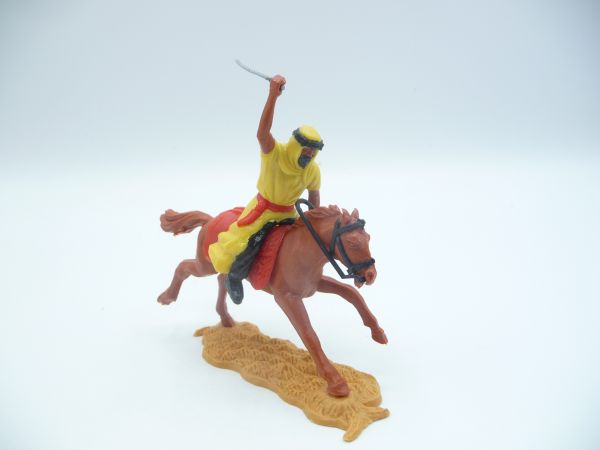 Timpo Toys Arab standing, striking with sabre from above (yellow, black inner robe)