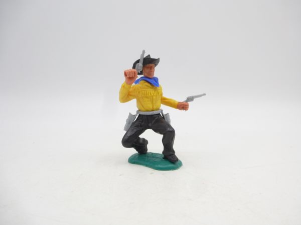 Timpo Toys Cowboy 2nd version crouching, firing 2 pistols wildly