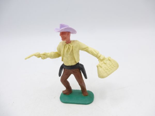 Timpo Toys Cowboy 1. Version, hellgelb mit Geldtasche + Pistole