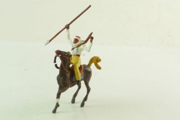 Merten Arab riding with spear and rifle