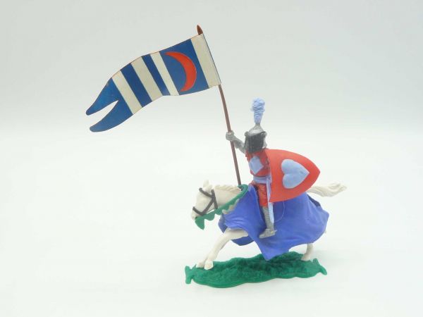 Timpo Toys Visor knight red/light blue on horseback with very rare original flag