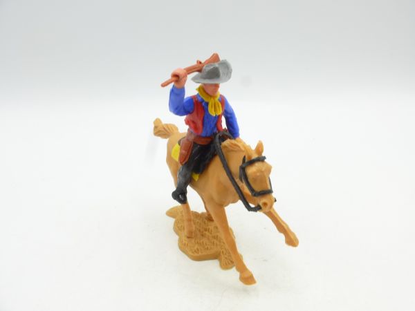 Timpo Toys Cowboy 2nd version riding, striking with rifle