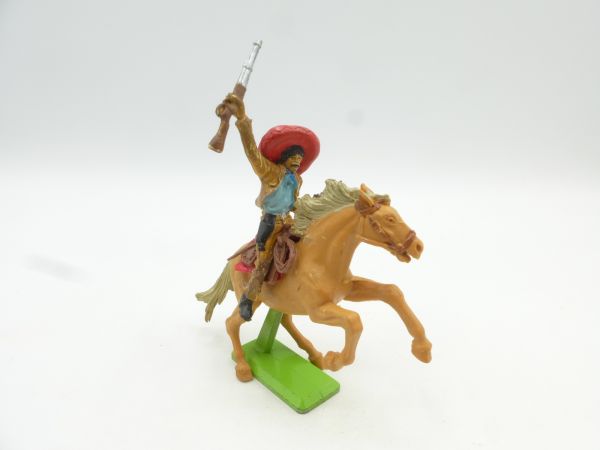 Britains Deetail Mexican riding with pistol, rifle held high