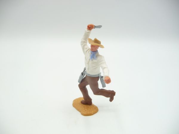 Timpo Toys Cowboy 2nd version running, throwing knife