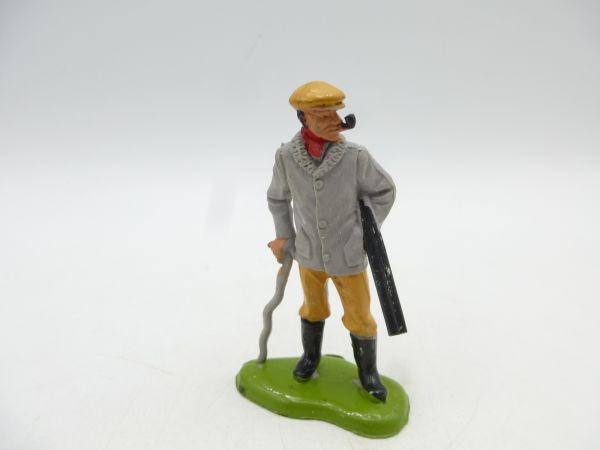 Britains Swoppets Farmer with stick, rifle + pipe, grey jacket