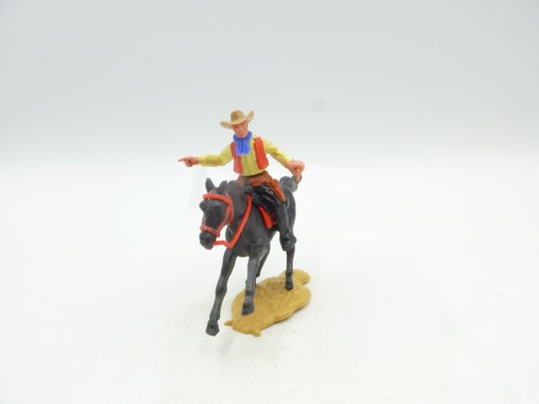 Timpo Toys Cowboy mounted with rifle, pointing
