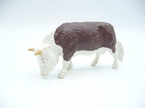 Britains Cow grazing, brown/white