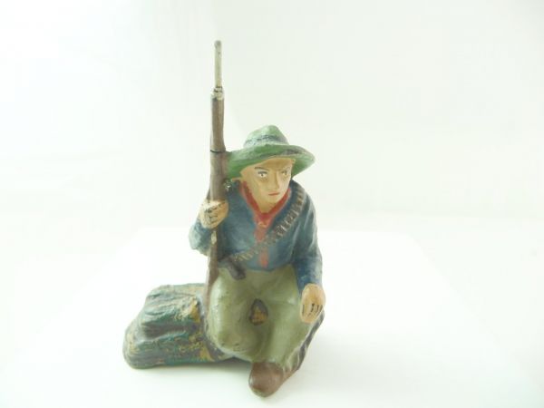 Lineol Cowboy sitting on tree trunk - good condition