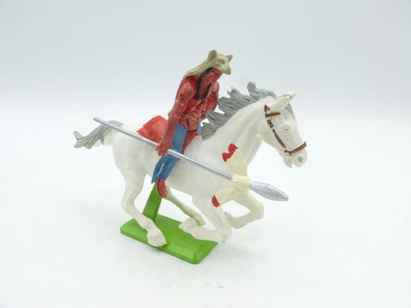 Britains Deetail Indian riding, holding spear sideways, with bear skin