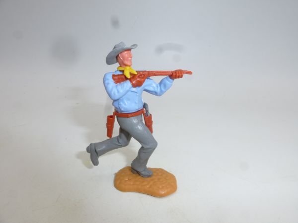 Timpo Toys Cowboy 2. Version laufend mit kurzem Gewehr, hellblau
