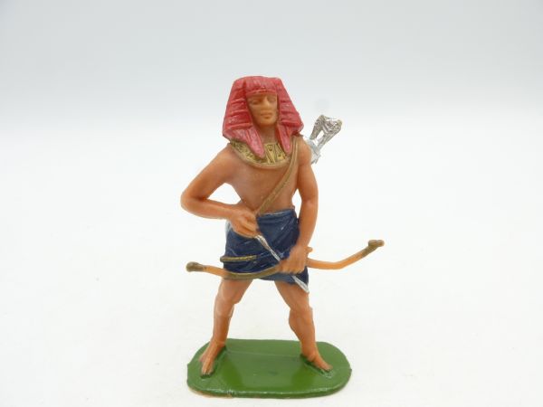 Jescan Egyptian standing with bow, placing arrow