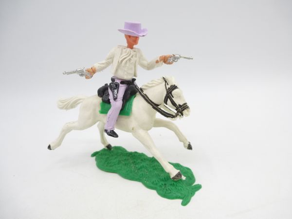 Timpo Toys Cowboy 1. Version reitend, 2 Pistolen schießend