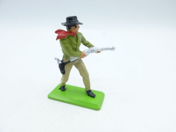 Britains Deetail Cowboy standing, shooting from the hip, lime green shirt