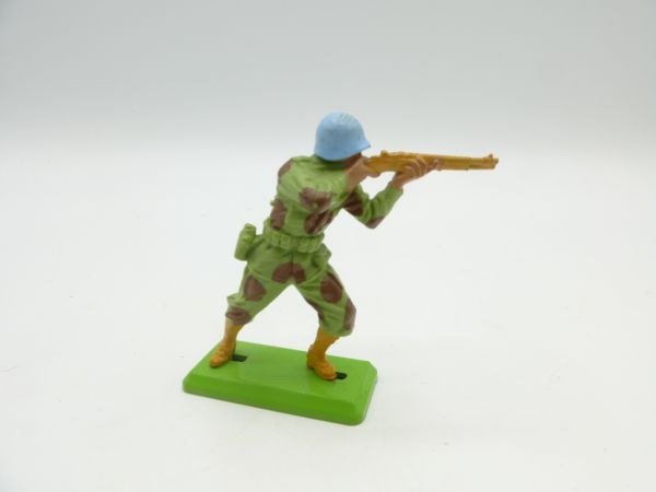 Britains Deetail Task Force, soldier standing firing