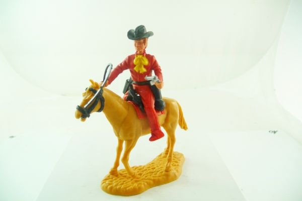 Timpo Toys Cowboy / Gentleman mit seltenem Oberteil auf gehendem Pferd